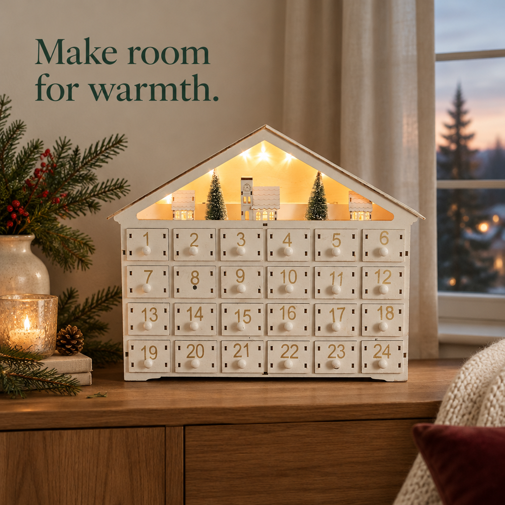 Lighted White Wooden House Advent Calendar – 24 Drawers — in use