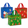 Three designs from the 12-piece Christmas gift bag assortment