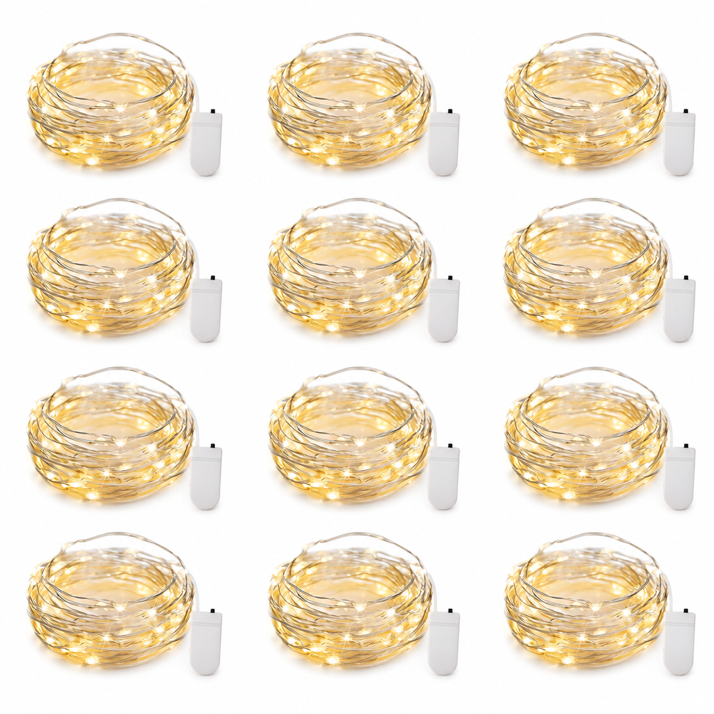 Set of 12 warm white battery operated fairy light strands with white battery cases