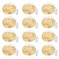 Set of 12 warm white battery operated fairy light strands with white battery cases